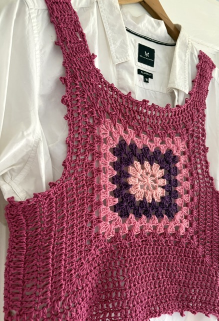CROCHET PATTERN for Picot Crochet Vest Top Crochet top in shades of pink with a square pattern, worn over a white shirt.